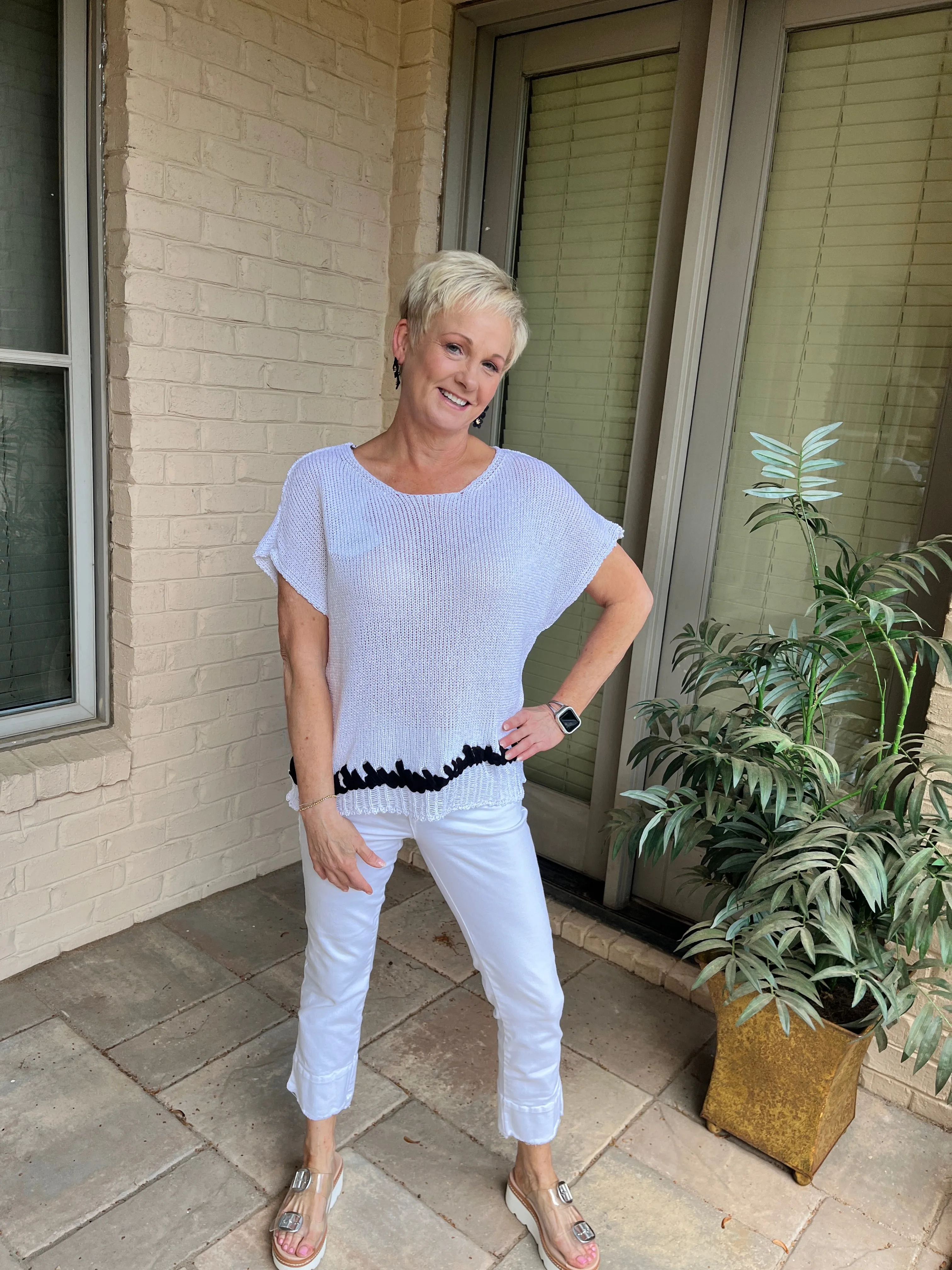 Open loop sweater with trim, knitted with a novelty contrasting yarn